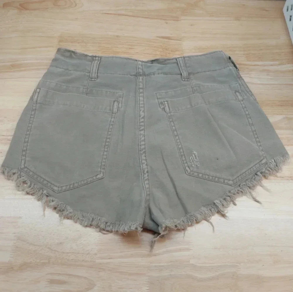 Free People Shorts Raw Frayed hems Tan brown Size 4 Pockets Beach Resort…